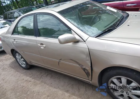2003 Toyota Camry Xle from USA, damaged, VIN 4T1BE32K03U669470